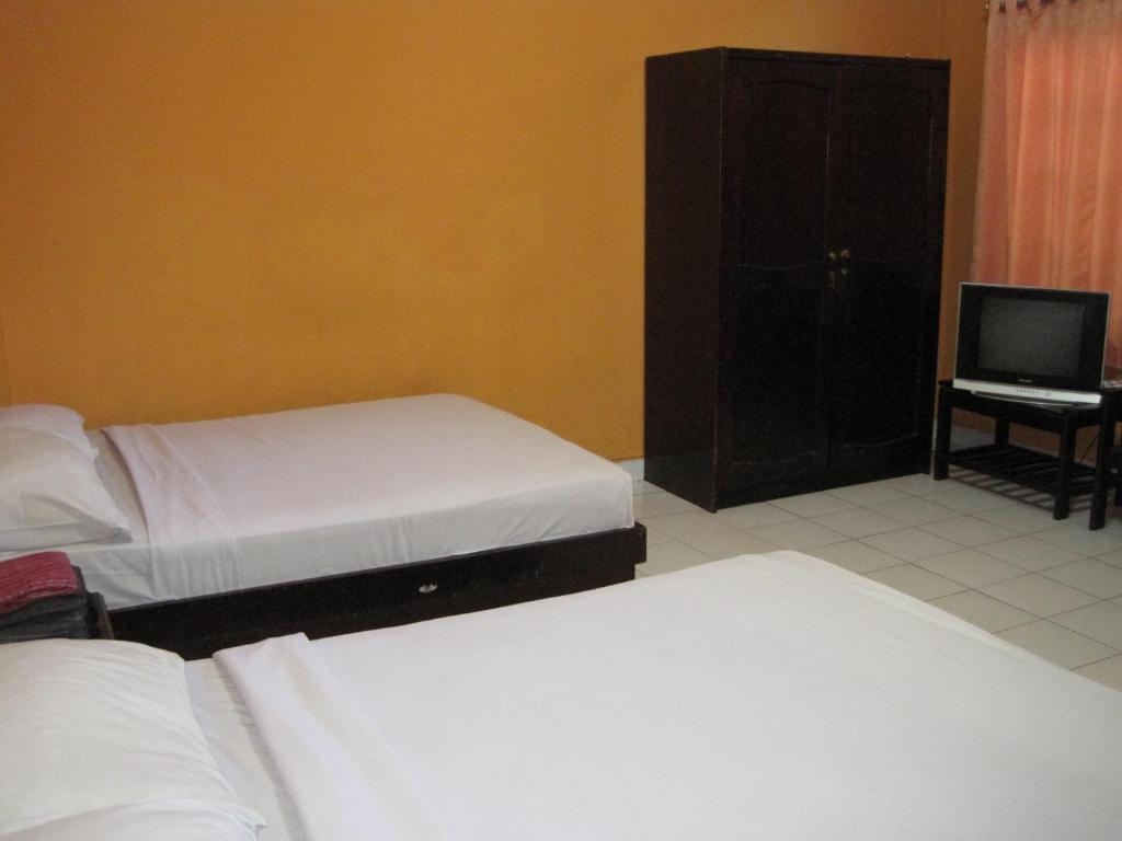 Sekar Sari Inn Кута Стая снимка