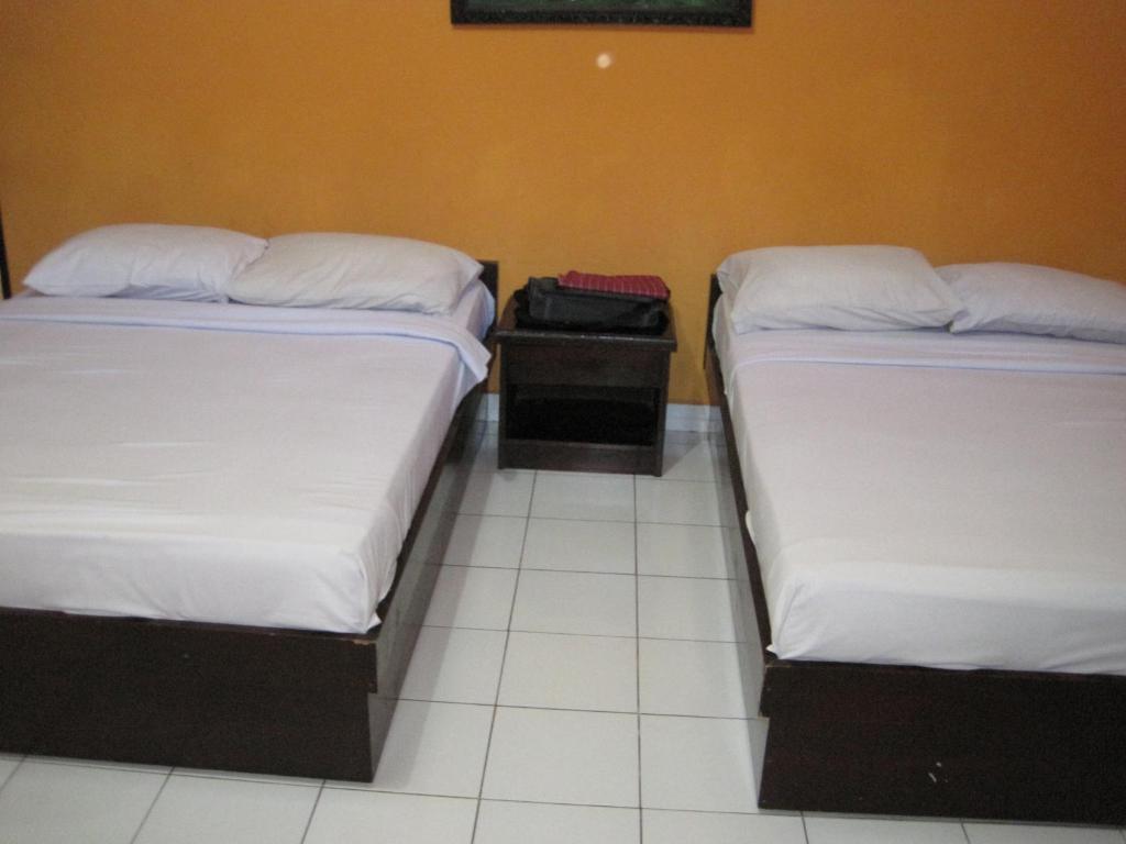 Sekar Sari Inn Кута Стая снимка
