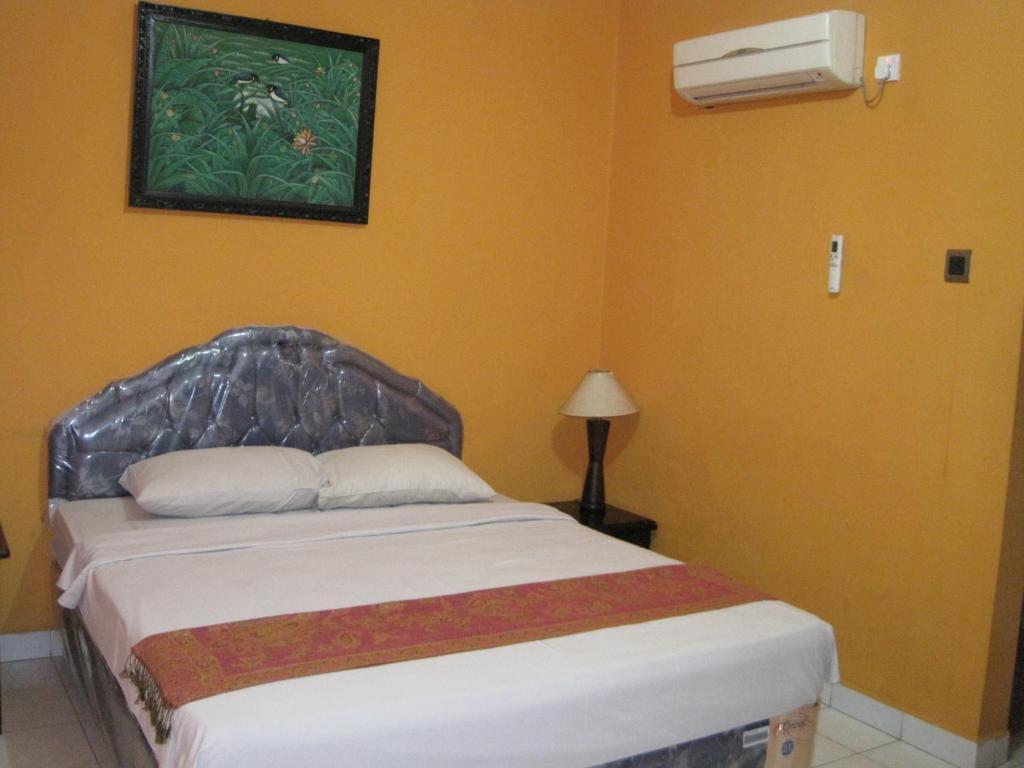 Sekar Sari Inn Кута Стая снимка