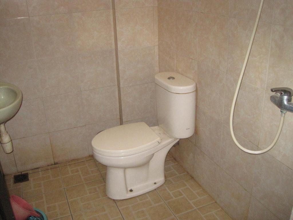 Sekar Sari Inn Кута Стая снимка