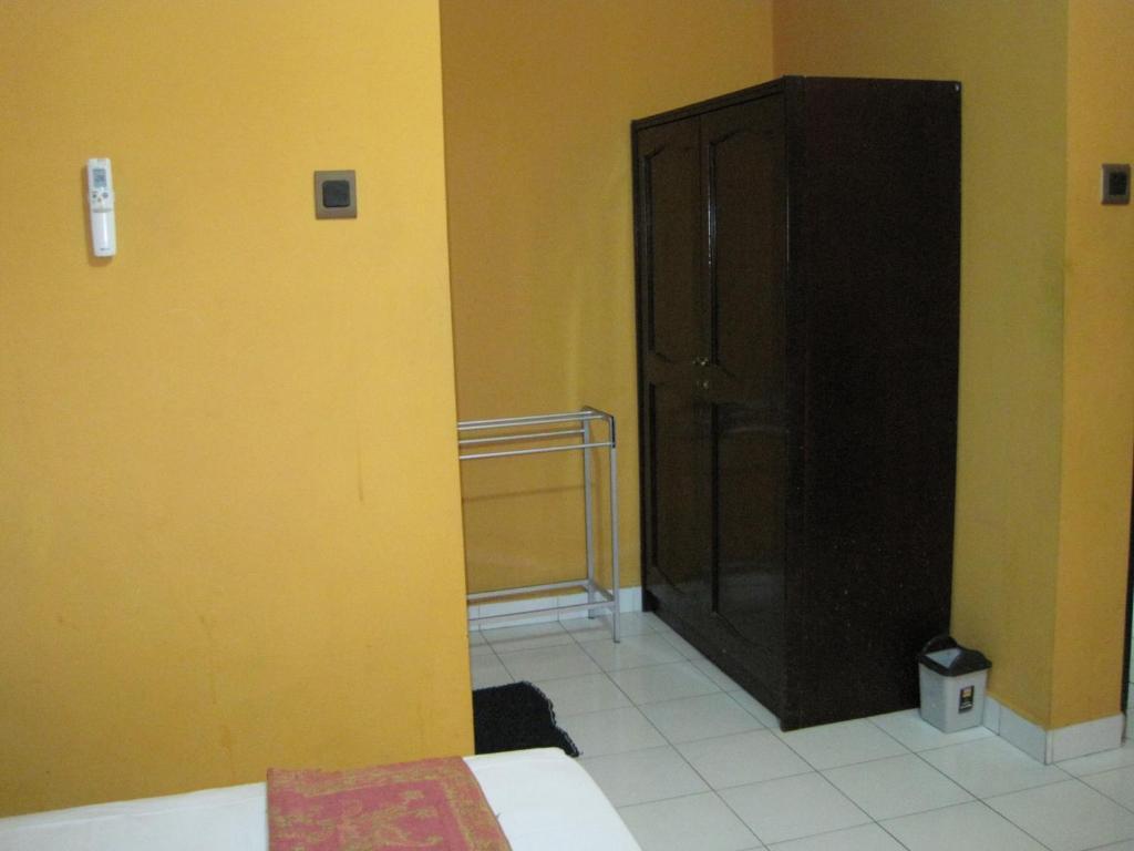 Sekar Sari Inn Кута Стая снимка